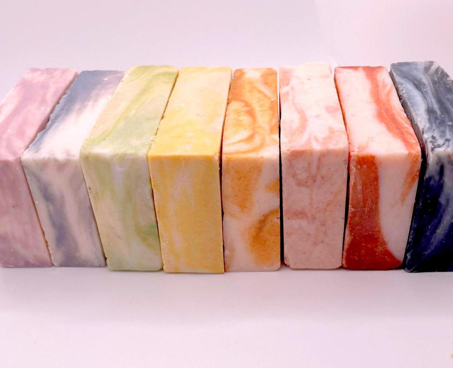 rainbow of salt soap bars in a row